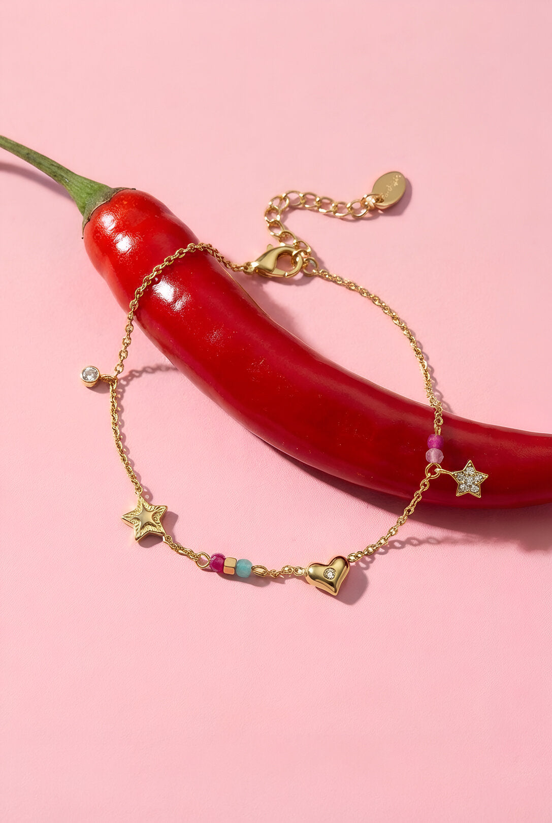 Bracciale con ciondoli a forma di cuore, stella, pietre e perline