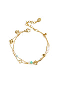 Bracciale con quadrifoglio, perline e pietre